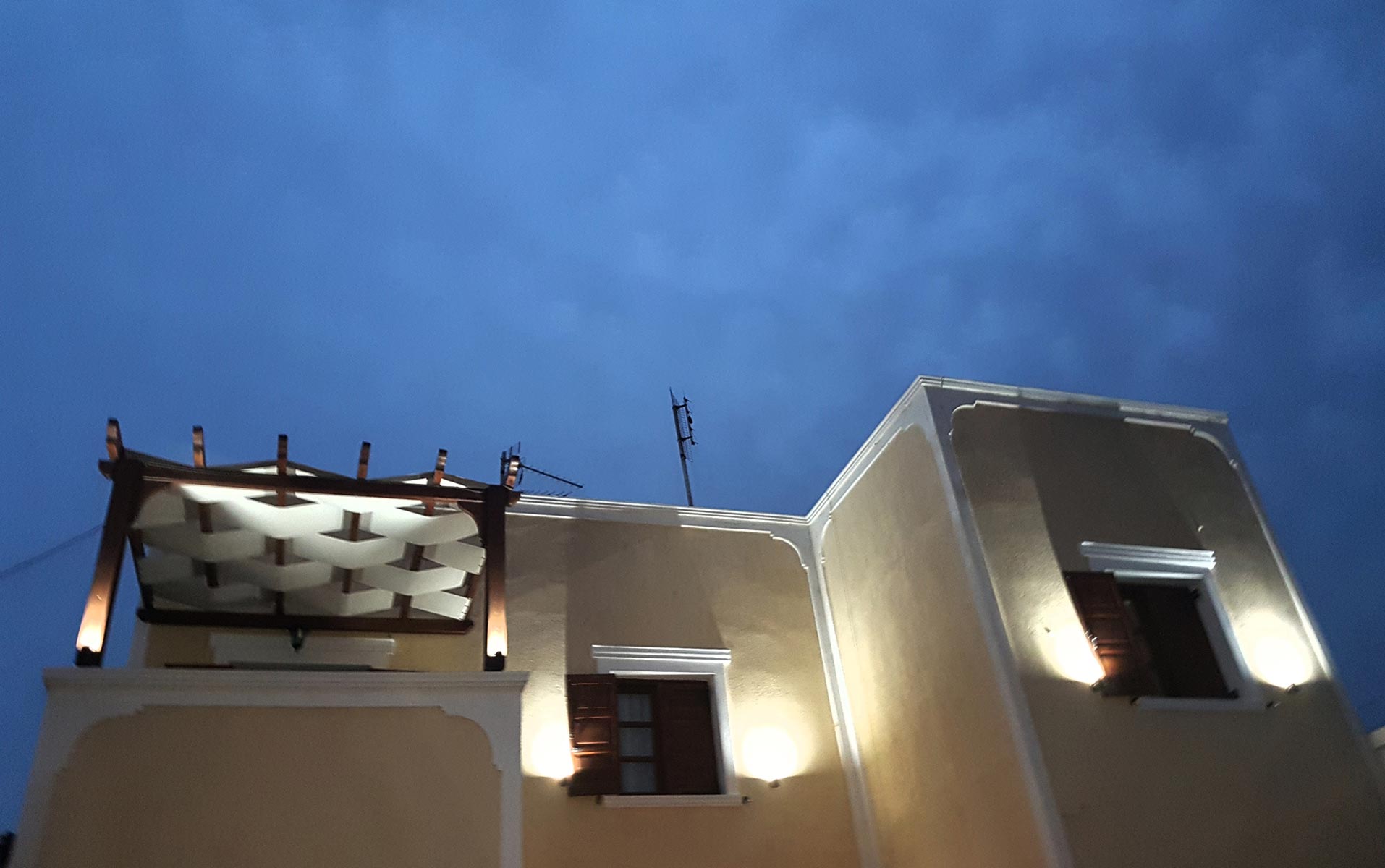 Santorini Family Apartments at dusk